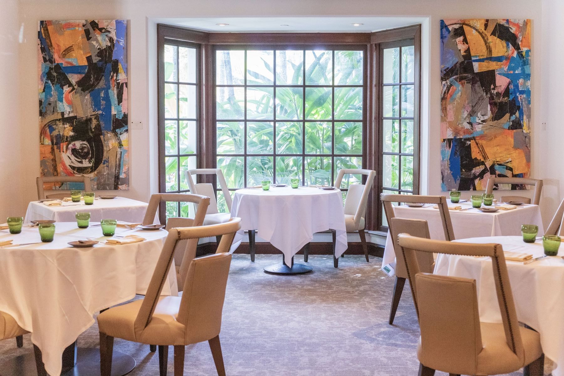 Indoor dining setup in Café Boulud at Brazilian Court  