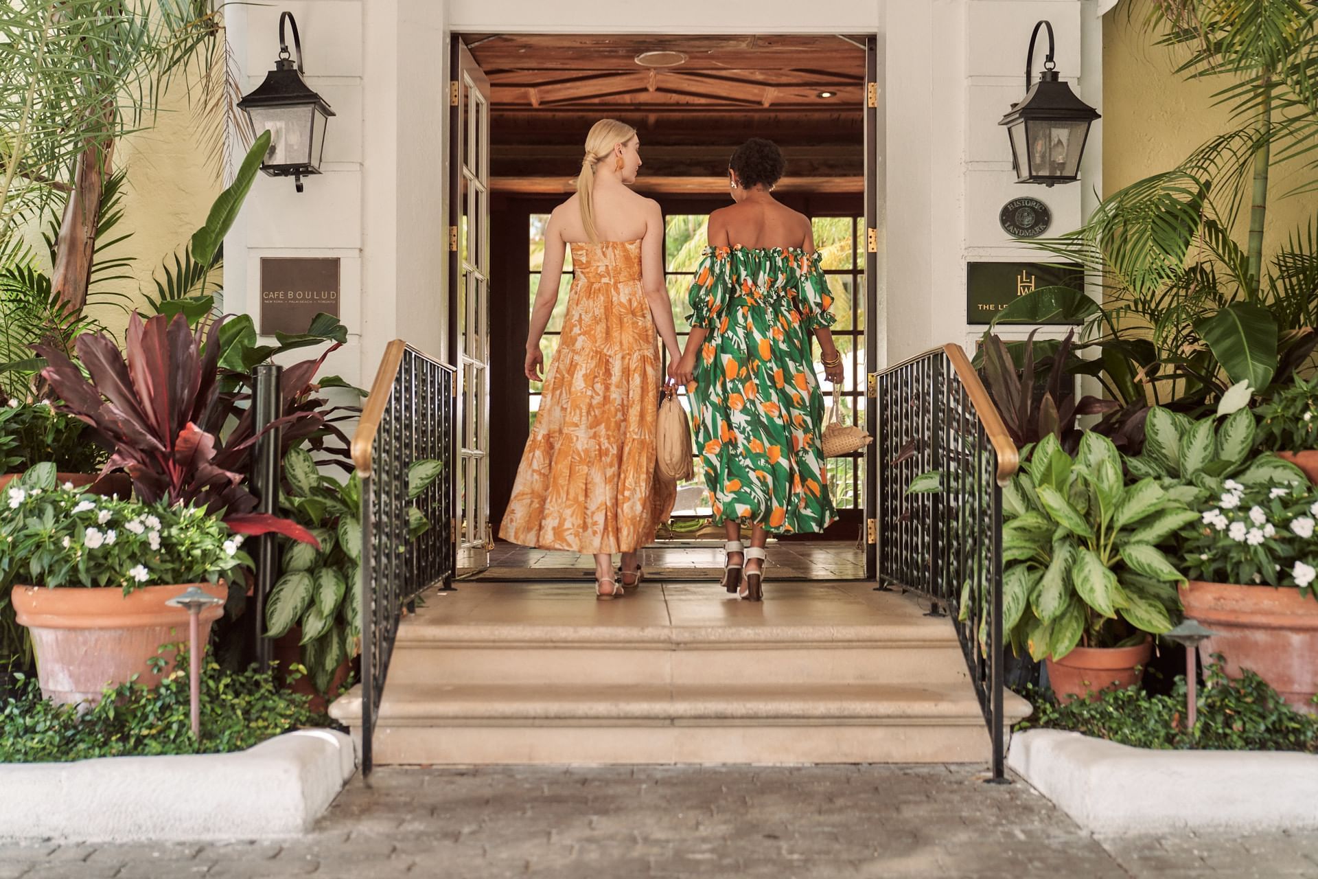 Two women entering to the entrance of Brazilian Court