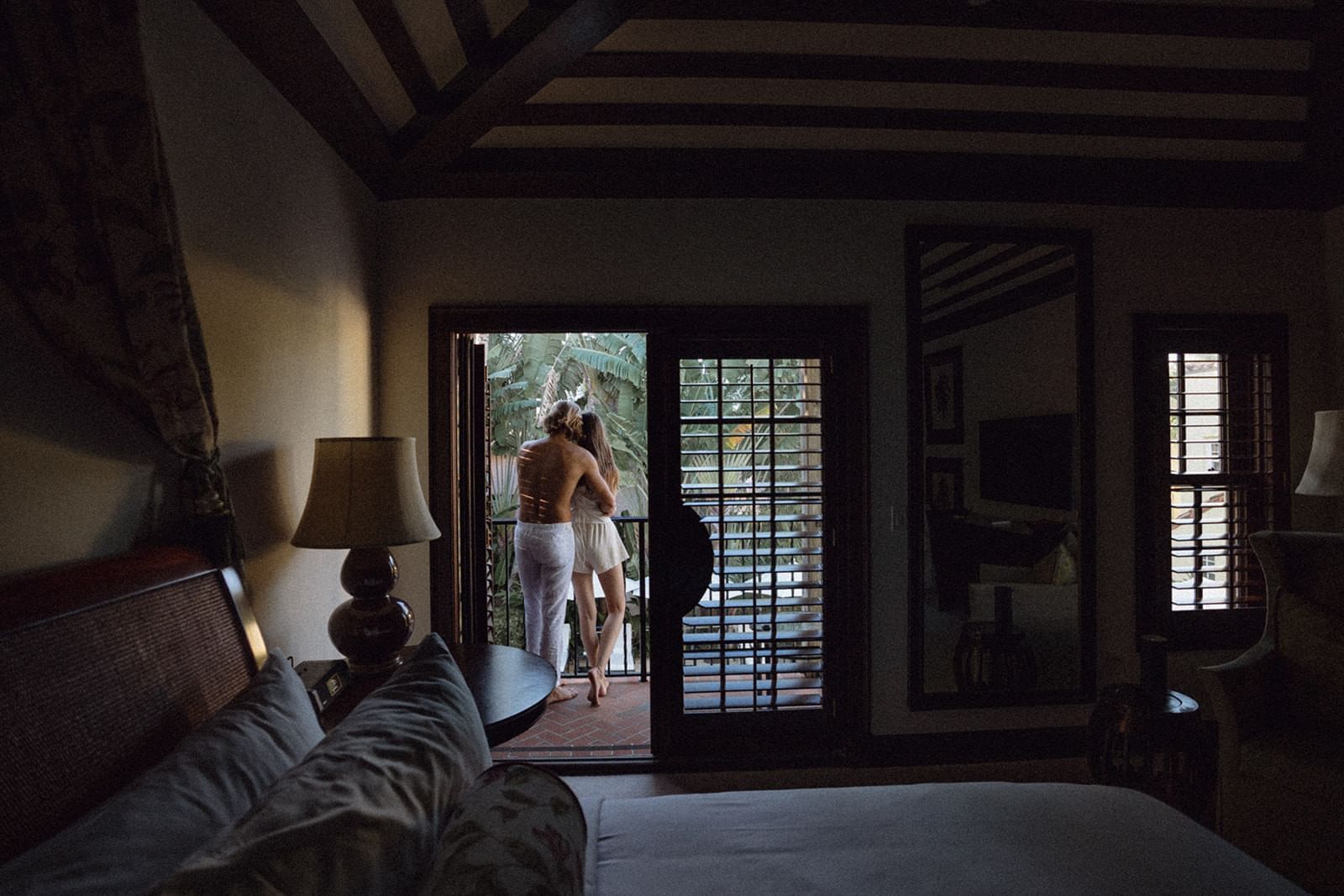 A couple spending time together in a room at Brazilian Court 