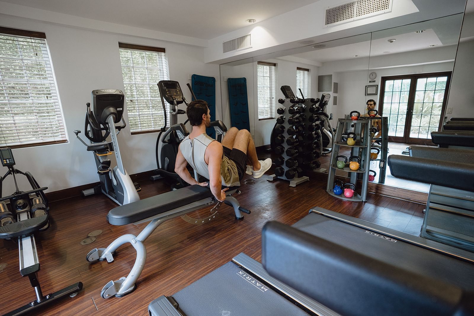 A man working out in a gym at Brazilian Court
